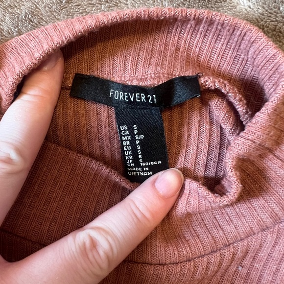 Turtle necked mini dress - Picture 2 of 3